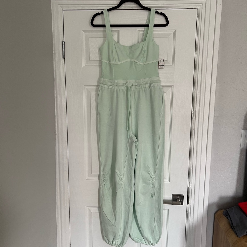 NWT- Free People Movement Inbound Onesie Size S